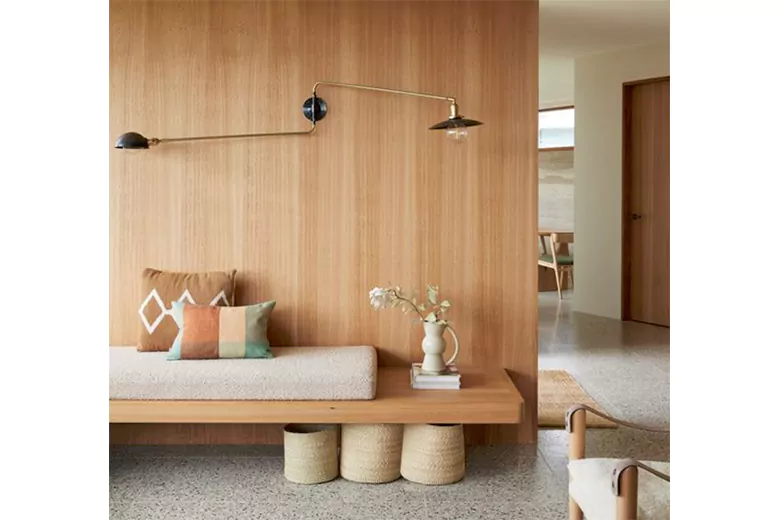 A Scandinavian living room with warm wood furniture A Scandinavian living room with warm wood furniture