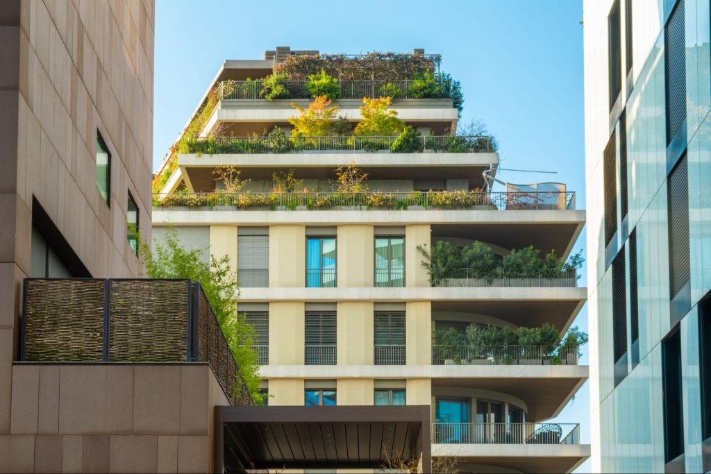 Picture of a building with lush green vertical gardens showcasing sustainable interior design. Picture of a building with lush green vertical gardens showcasing sustainable interior design.