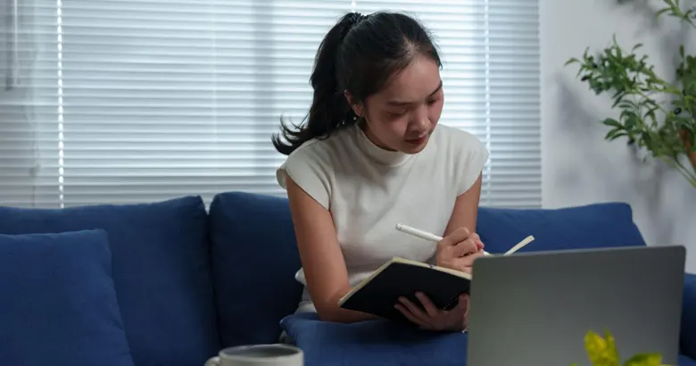 A girl learning UI UX design without a background in design.