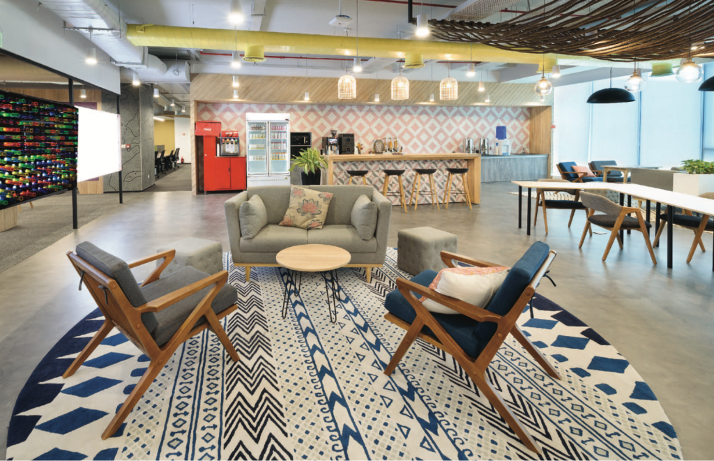 Picture of a modern office featuring a large rug and stylish chairs.
Picture of a modern office featuring a large rug and stylish chairs.