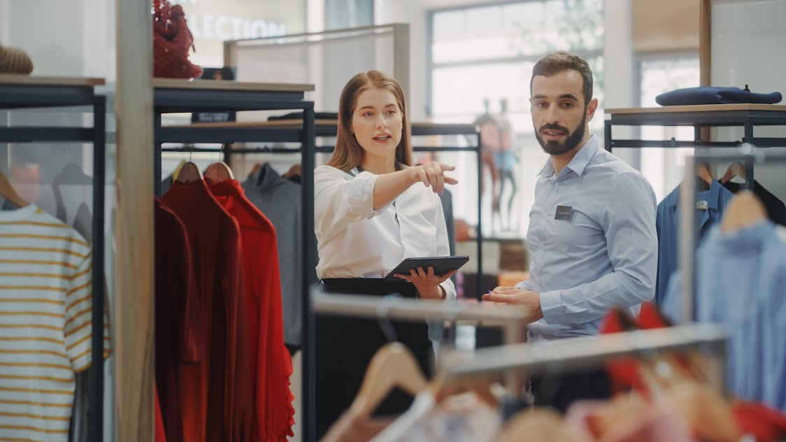Visual merchandising manager explaining the merchandiser role to a new hire.