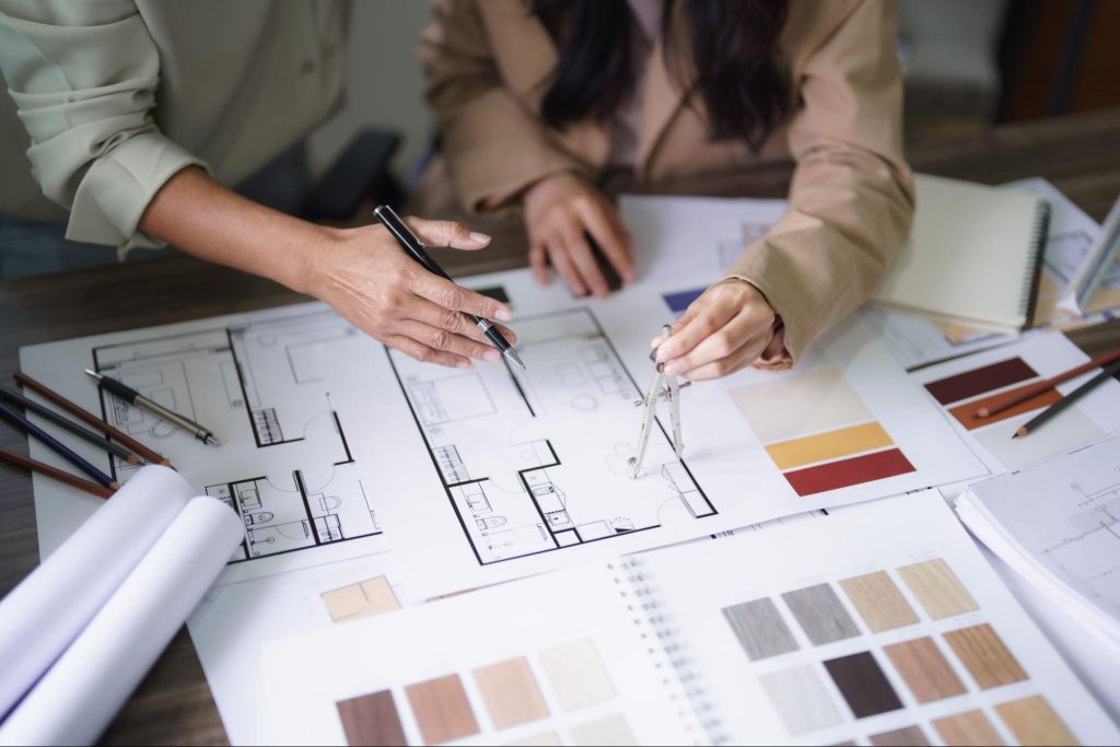 Designers working on creating a floor plan
Designers working on creating a floor plan