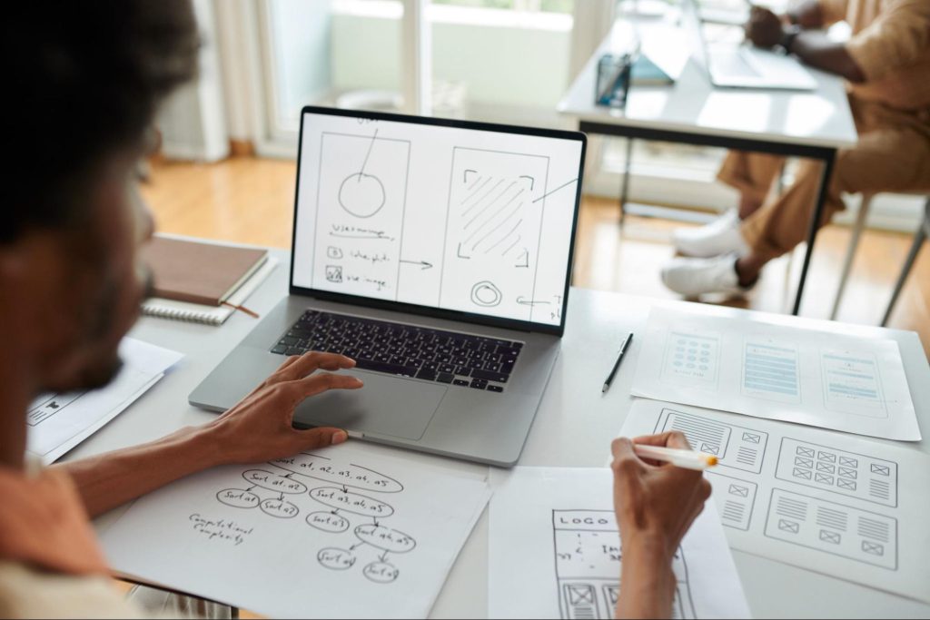 A designer creating an adaptive product design wireframe
A designer creating an adaptive product design wireframe