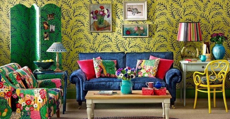 Image showing floral print sofas with an eclectic mixed-style design and a green background.