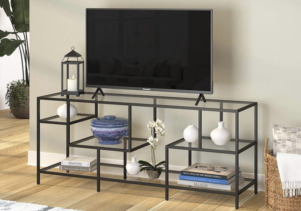 Picture of a stylish TV stand with a glass top. Picture of a stylish TV stand with a glass top.