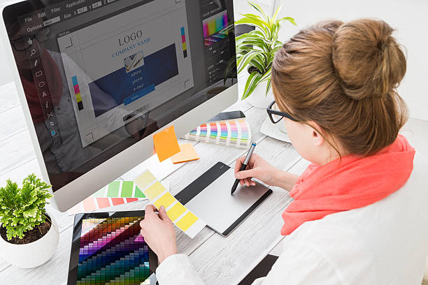A freelance graphic designer working on a client project