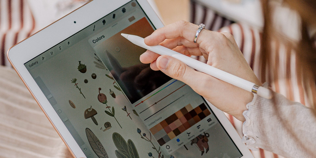 A graphic design app screen with a color palette and drawing tools