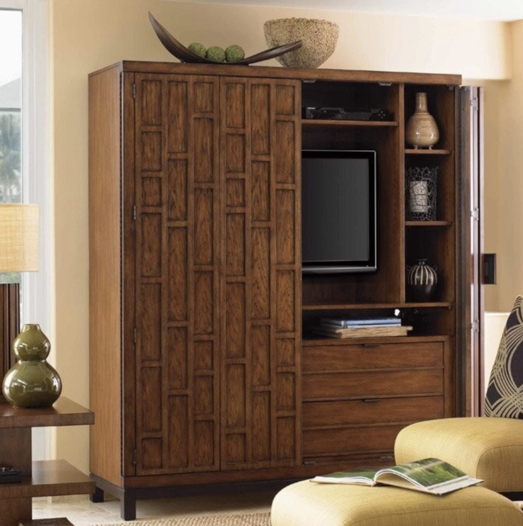 TV in a wooden cabinet. TV in a wooden cabinet.
