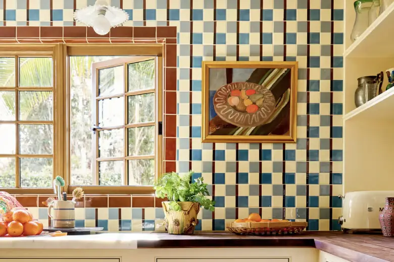 Kitchen with bold color tile backsplash.
