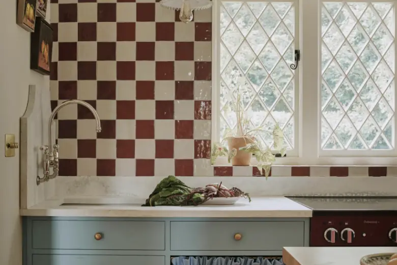 Kitchen with a checkered tile backsplash.
