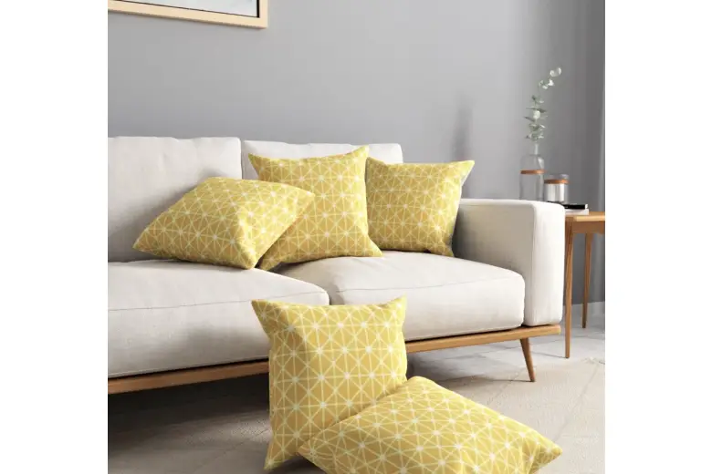 Eco-friendly sofa with yellow geometric pillows. Eco-friendly sofa with yellow geometric pillows.