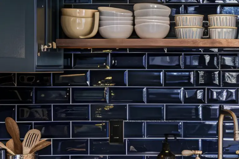 Kitchen with dark blue tile backsplash.
