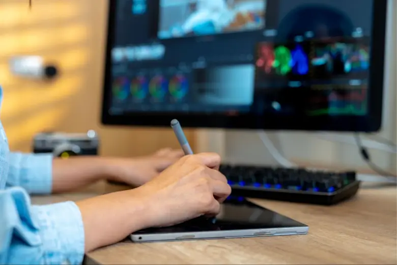 A designer working on their environmental graphic design portfolio