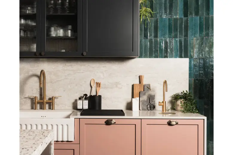 Art Deco kitchen with pink and black cabinets.
Art Deco kitchen with pink and black cabinets.