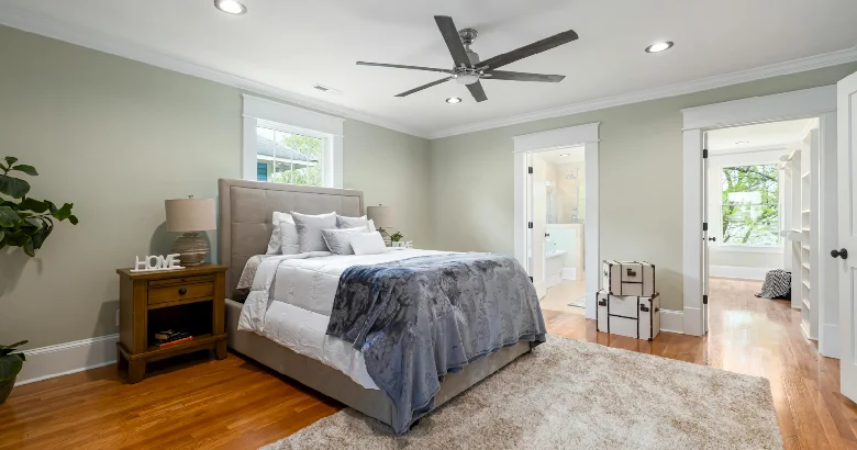 Bedroom design with calming colors, cozy bedding, and minimal clutter for better sleep.
