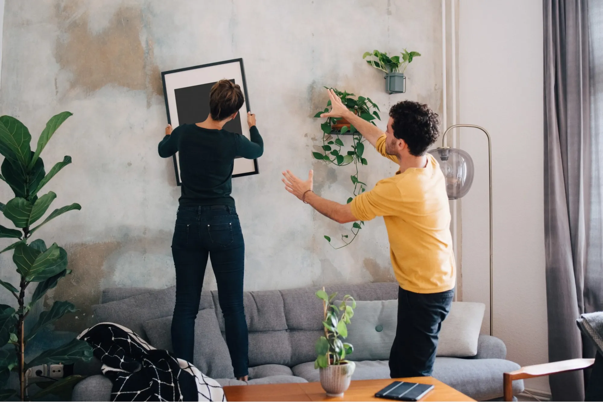 Interior designers designing a living room according to Feng Shui Interior designers designing a living room according to Feng Shui