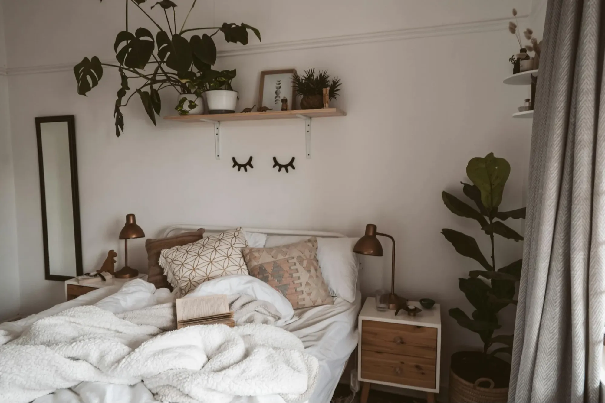 Incorporating plants and natural decor for a calming bedroom atmosphere.
