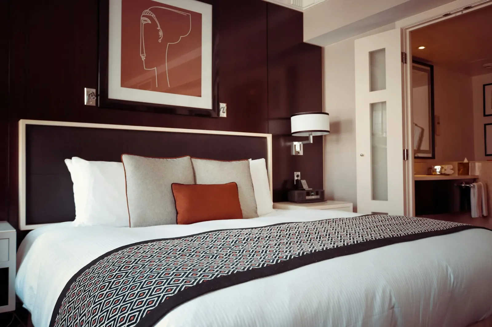Bedroom with soothing wall colors designed to create a calming environment for better sleep.
