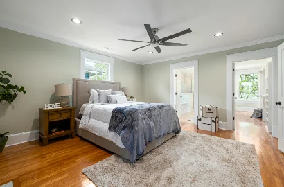Bedroom design with calming colors, cozy bedding, and minimal clutter for better sleep.