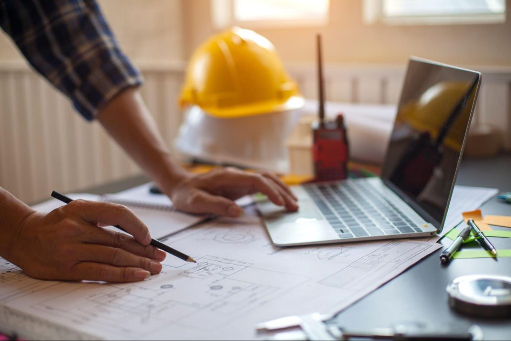 Picture of an engineer working on a construction project.
Picture of an engineer working on a construction project.