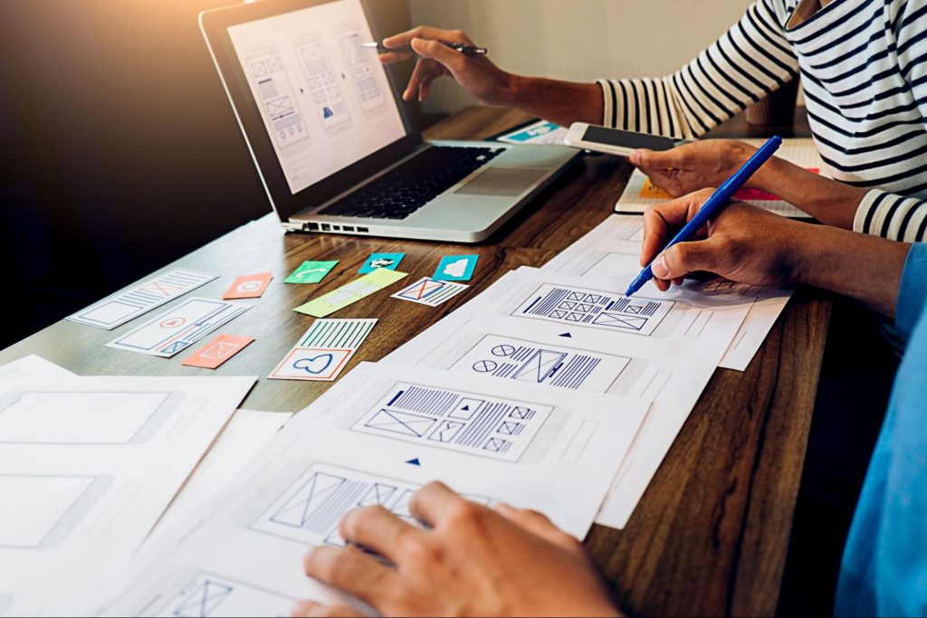 UX designers working on a wireframe design
UX designers working on a wireframe design