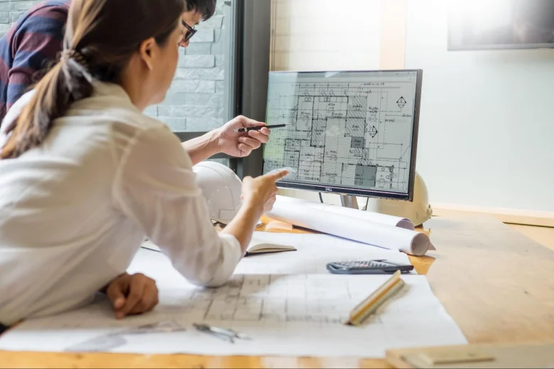 Architects working on a floor plan