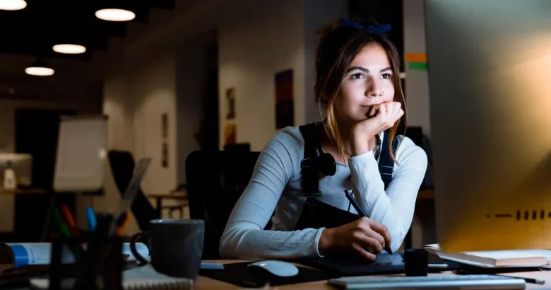 A graphic design student attending a live, online class