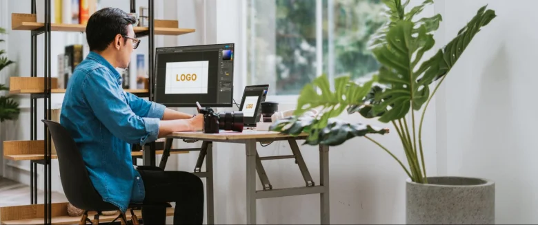 A graphic designer learning to design a logo
