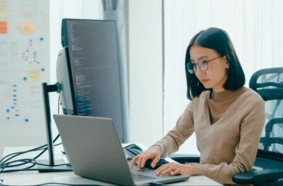 A graphic designer using an AI prompt to create a logo design